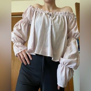light pink flowy off the shoulder blouse